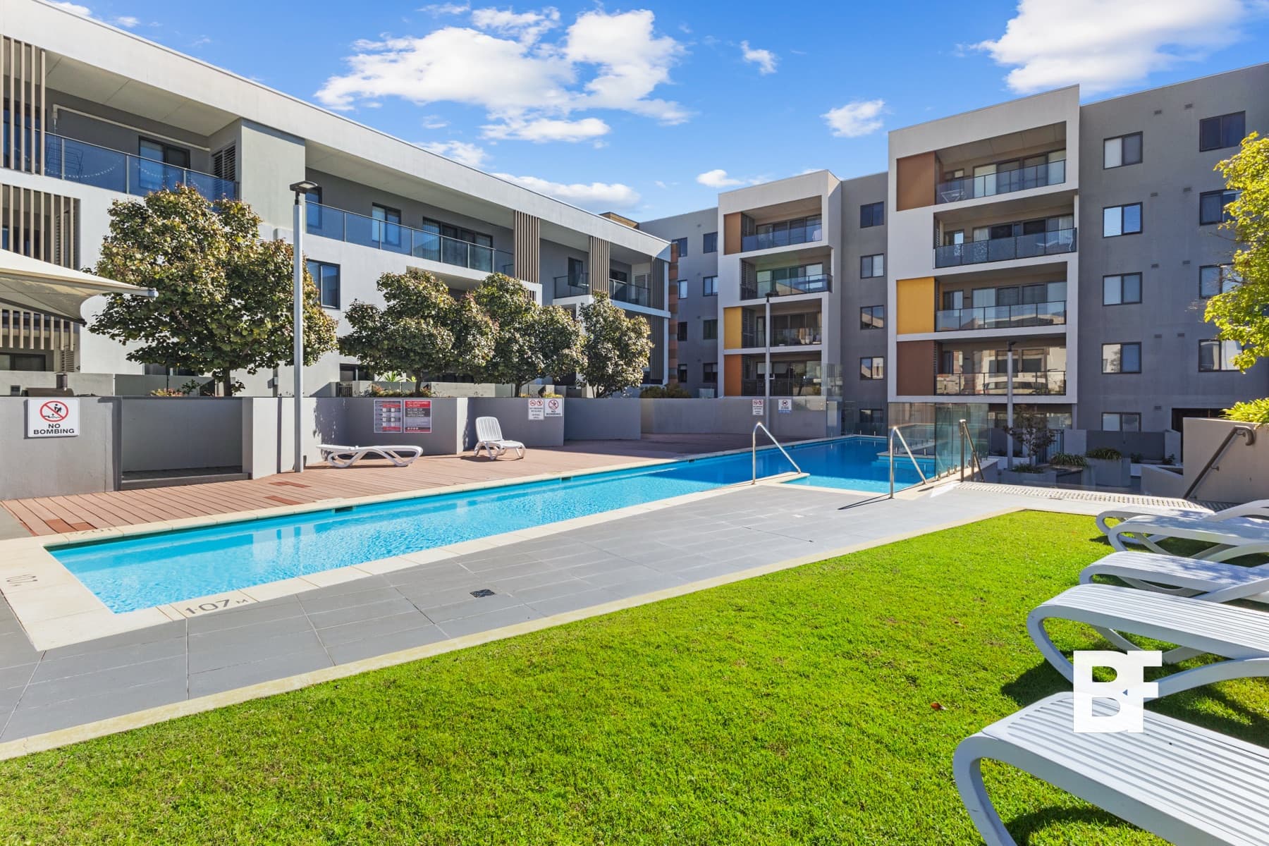 Apartment swimming pool and shared outdoor area photographed by BASEFORM