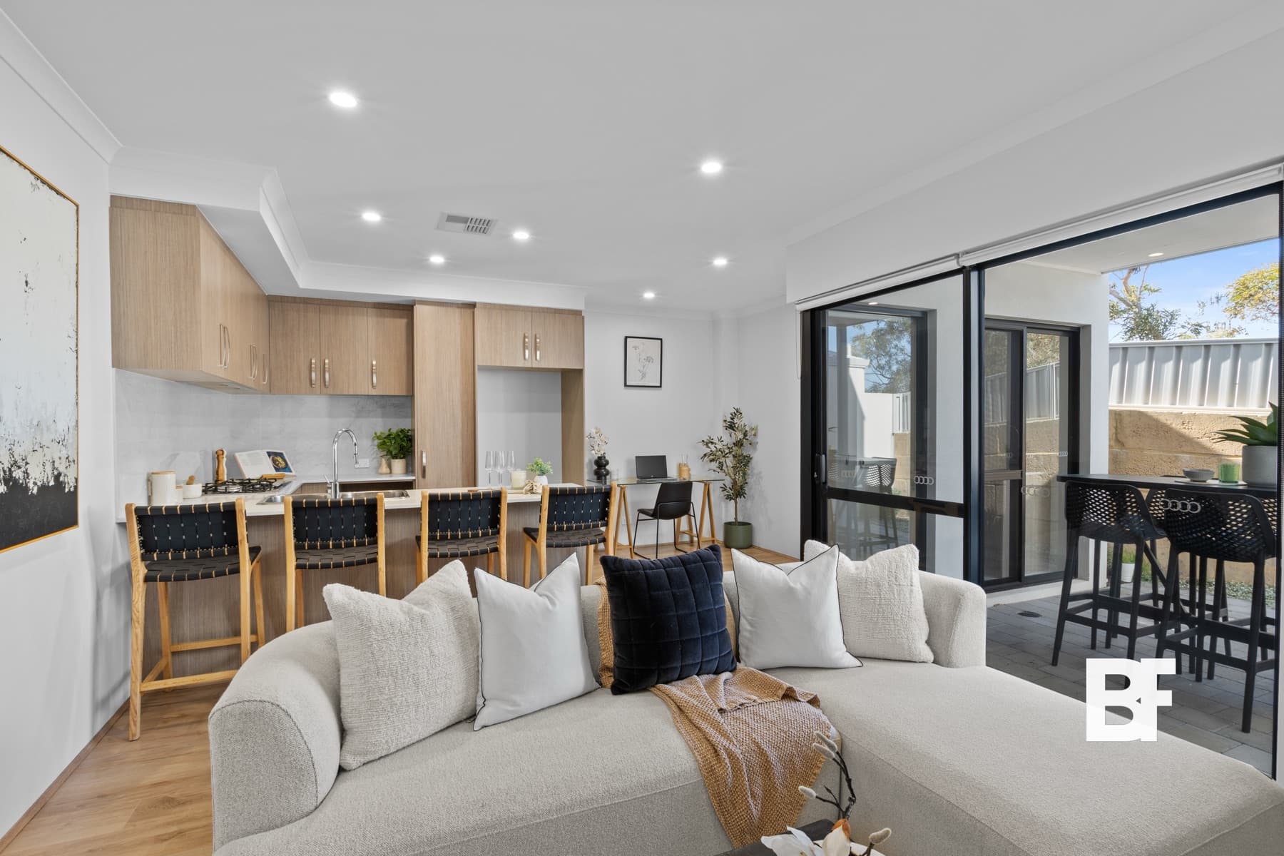 Open-plan kitchen, lounge and dining space photographed by BASEFORM